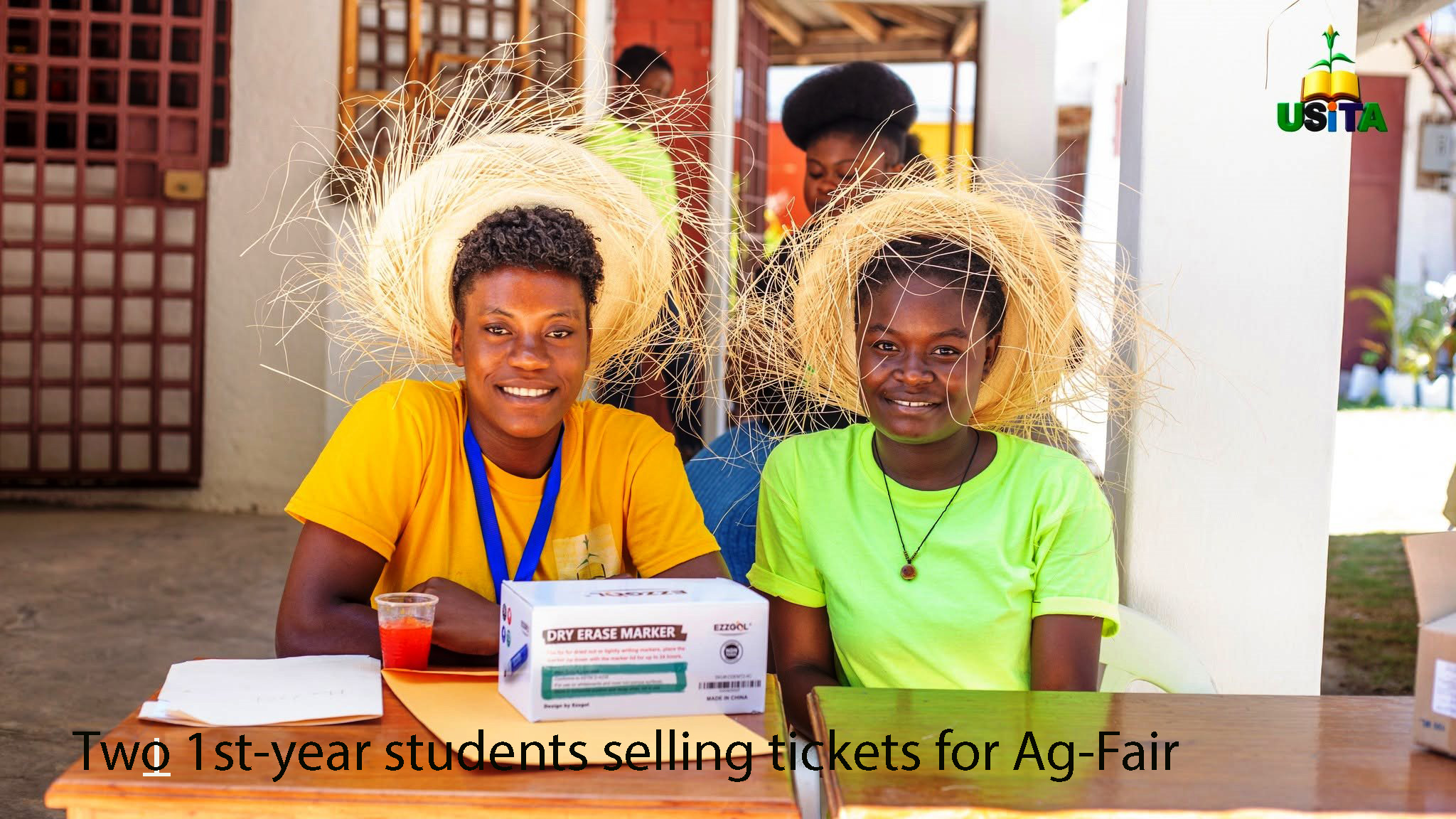 First year students selling tickets for  the fair